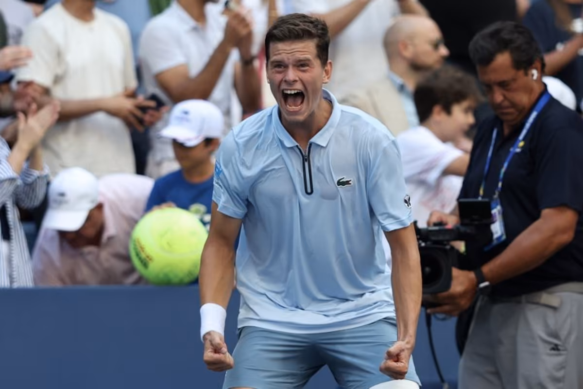 Belgium's Alexander Blockx celebrates defeating Italy's Flavio Cobolli during at the end of their men's singles third round tennis match on day seven of the US Open tennis tournament at the USTA Billie Jean King National Tennis Center in New York City on September 5, 2026. TIMOTHY A. CLARY / AFP