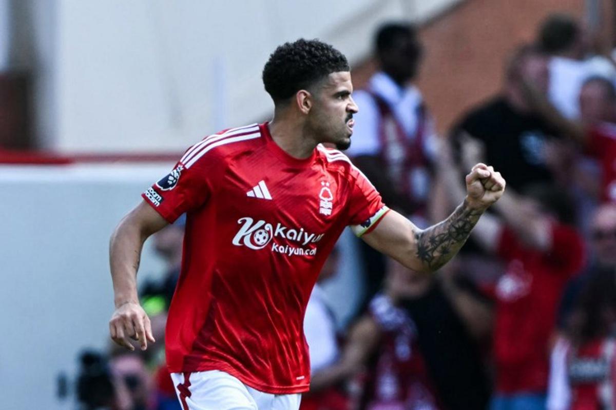 Nottingham Forest's English midfielder #10 Morgan Gibbs-White celebrates after scoring his team first goal during the English Premier League football match between Nottingham Forest and Leicester City at The City Ground in Nottingham, central England, on May 11, 2025. JUSTIN TALLIS / AFP