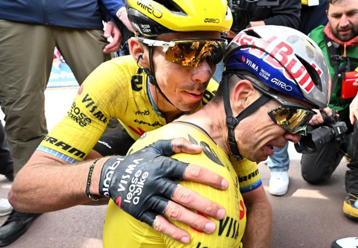 Team Visma - Lease a Bike's French rider Christophe Laporte (L) congratulates winner Team Visma - Lease a Bike's Belgian rider Wout van Aert at the end of the 123rd edition of the Paris-Roubaix one-day classic cycling race, 258.3 km between Compiègne and Roubaix, at the Vélodrome André-Pétrieux in Roubaix, northern France, on April 12, 2026. Etienne GARNIER / POOL / AFP