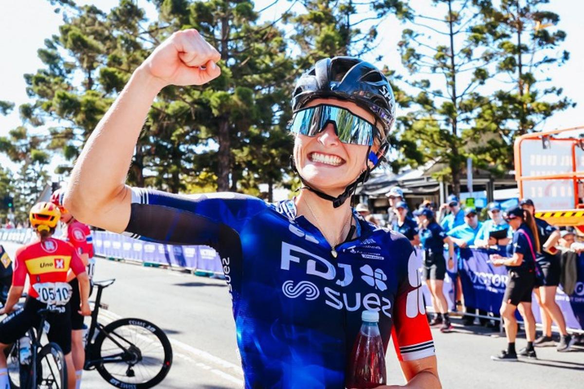 Race winner New Zealand's Ally Wollaston of Team FDJ-Suez celebrates her victory in the women's elite cycling event of the 2025 Cadel Evans Great Ocean Road Race in Geelong on February 1, 2025. CHRIS PUTNAM / AFP