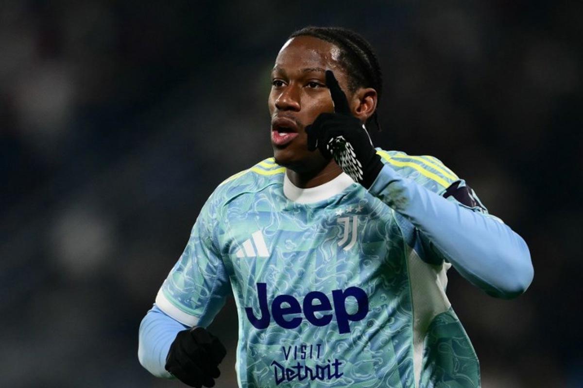 Juventus' Canadian forward #30 Jonathan David celebrates scoring his team's third goal during the Italian Serie A football match between Sassuolo and Juventus at the Mapei - Città del Tricolore stadium in Reggio Emilia, on January 6, 2026. Marco BERTORELLO / AFP
