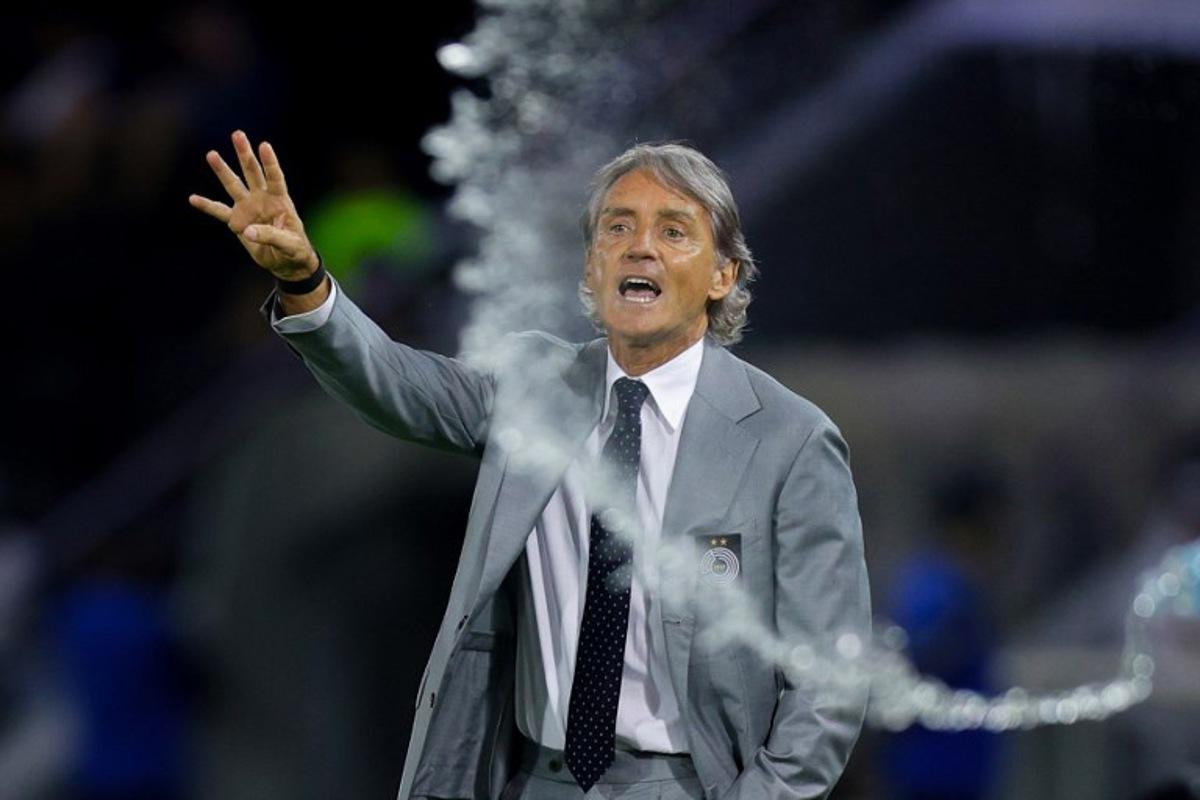 Sadd's Italian coach Roberto Mancini instructs his players during the Qatar Stars League match between Al-Sadd and Al-Shamal at Jassim Bin Hamad Stadium in Doha on April 27, 2026. Karim JAAFAR / AFP