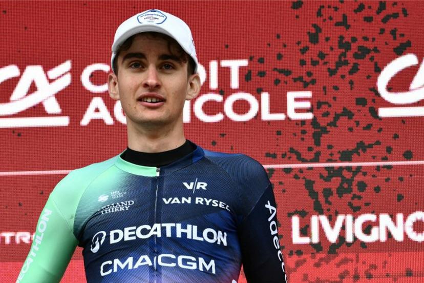 UCI WorldTeam Decathlon CMA CGM's French rider Paul Seixas celebrates on the podium after winning second place in the 20th one-day classic 'Strade Bianche' (White Roads) men's cycling race between Siena and Siena in Tuscany on March 7, 2026. Marco BERTORELLO / AFP