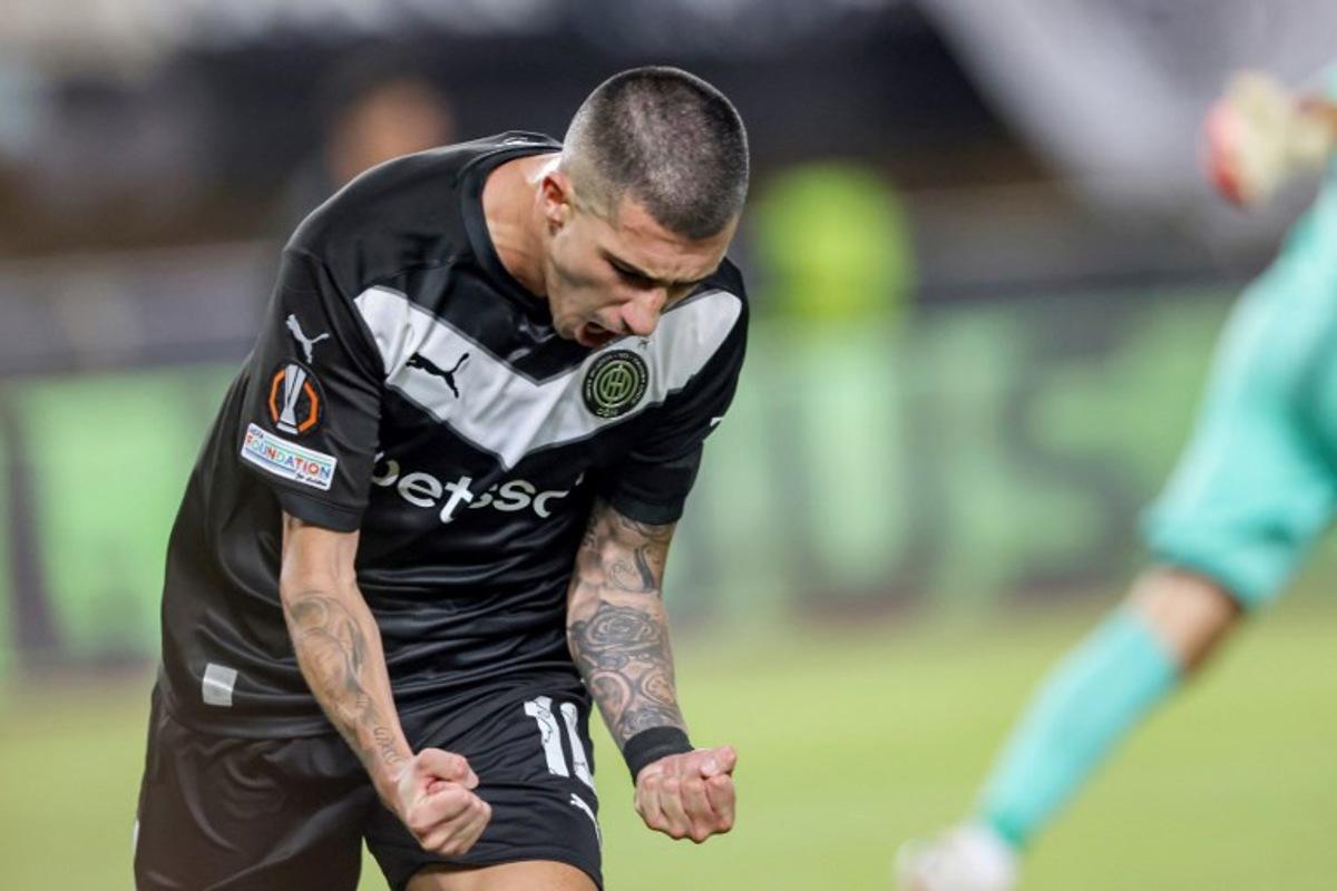 OFI's Spanish forward #10 Aitor Cantalapiedra celebrates his team's first goal during the UEFA Europa League first round football match between OFI Crete FC and TSG 1899 Hoffenheim at Pankritio stadium in Heraklion on September 17, 2026. Costas Metaxakis / AFP