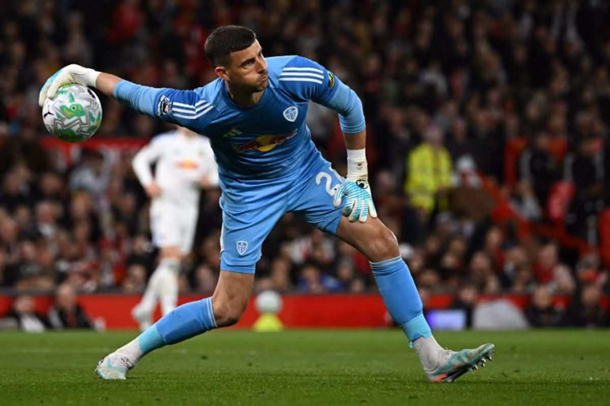 Leeds United's English goalkeeper #26 Karl Darlow throws the ball out during the English Premier League football match between Manchester United and Leeds United at Old Trafford in Manchester, north west England, on April 13, 2026. Paul ELLIS / AFP