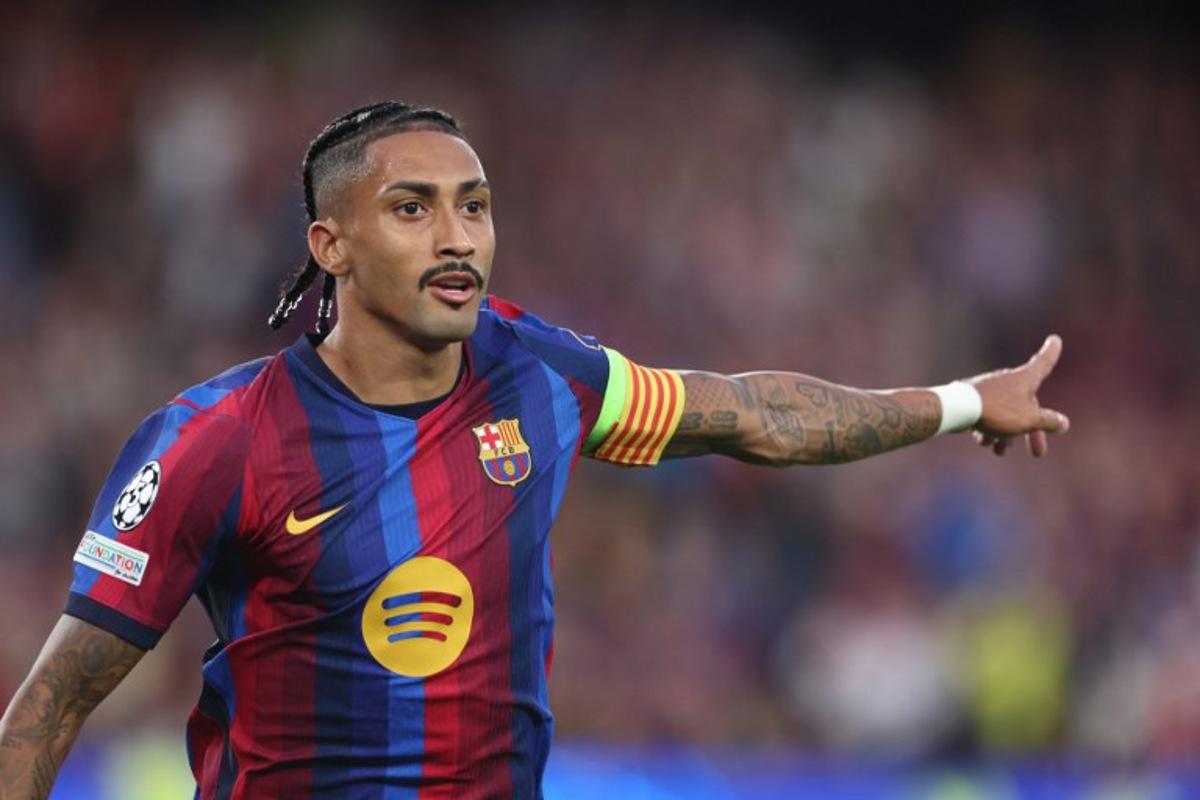 Barcelona's Brazilian forward #11 Raphinha celebrates scoring his team's third goal during the UEFA Champions League first round day 1 football match between FC Barcelona and Feyenoord at Camp Nou stadium in Barcelona on September 9, 2026. Josep LAGO / AFP