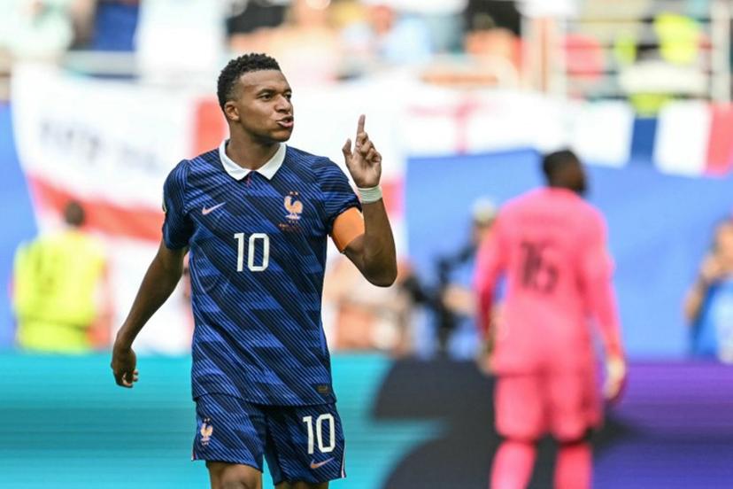 France's forward #10 Kylian Mbappe celebrates scoring his team's third goal during the 2026 World Cup football tournament third-place match between France and England at the Miami Stadium in Miami on July 18, 2026. CHANDAN KHANNA / AFP