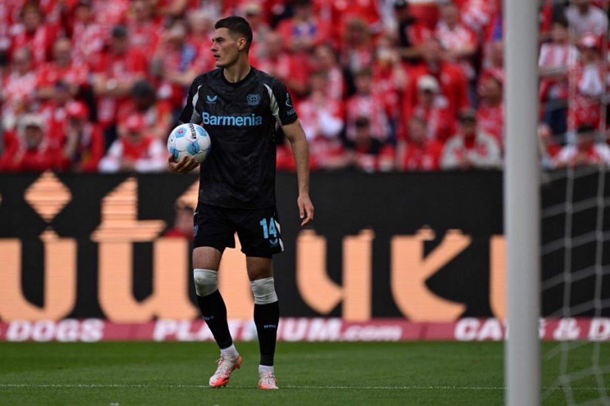 Bayer Leverkusen's Czech forward #14 Patrik Schick prepares to shoot from the penalty spot during the German first division Bundesliga football match between Mainz 05 and Bayer Leverkusen in Mainz, western Germany, on May 17, 2025. Kirill KUDRYAVTSEV / AFP