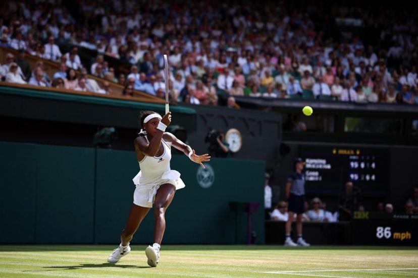 US player Coco Gauff returns to Czech Republic's Karolina Muchova during their women's singles semi-final tennis match on the eleventh day of the 2026 Wimbledon Championships at The All England Lawn Tennis and Croquet Club in Wimbledon, southwest London, on July 9, 2026. Henry NICHOLLS / AFP