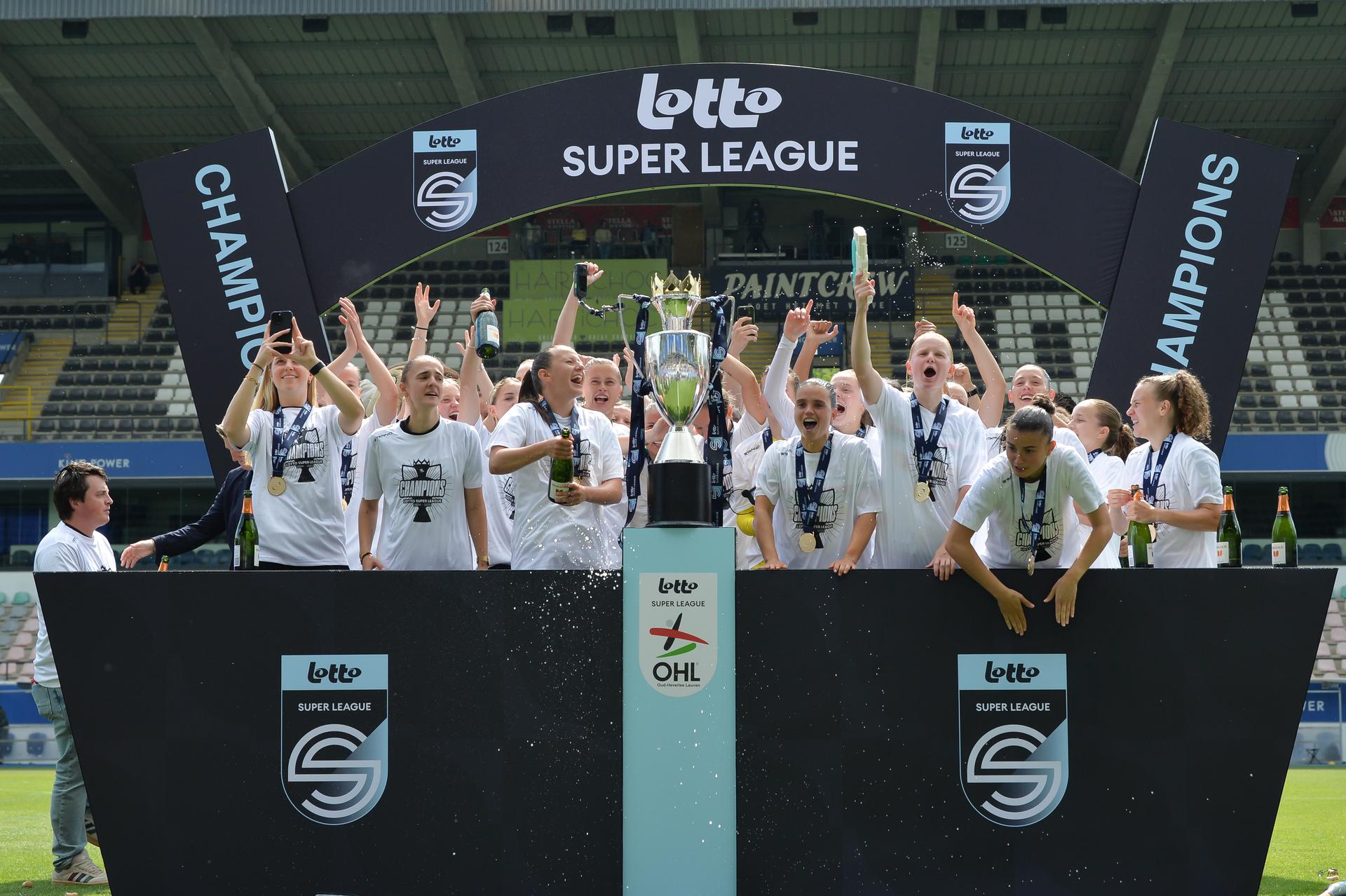 OHL's players celebrate the championship, after winning a soccer match between Oud-Heverlee Leuven and RSCA Women, Saturday 17 May 2025 in Heverlee, on day 6 (out of 6) of the Play-offs of the 2024-2025 'Super League Women' first division of the Belgian championship. BELGA PHOTO JILL DELSAUX