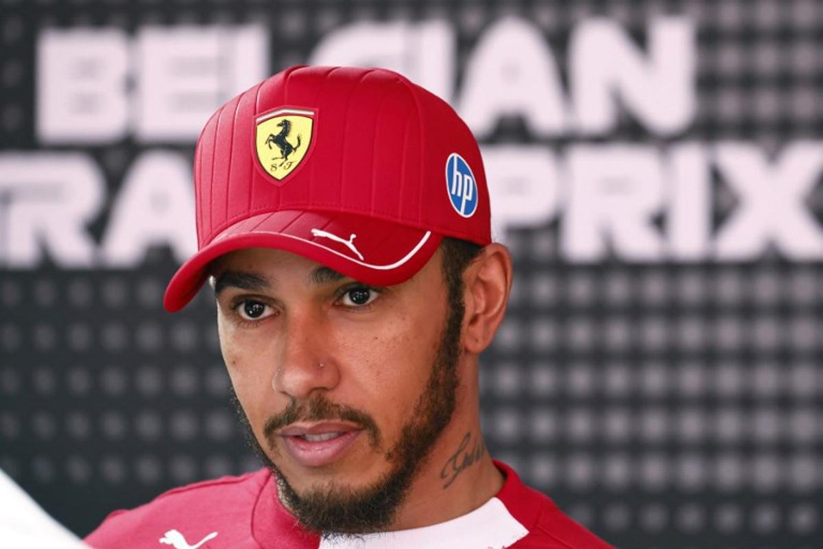 Ferrari's British driver Lewis Hamilton looks on after the Sprint Race of the Formula One Belgian Grand Prix at the Spa-Francorchamps circuit in Spa, on July 26, 2025. SIMON WOHLFAHRT / AFP