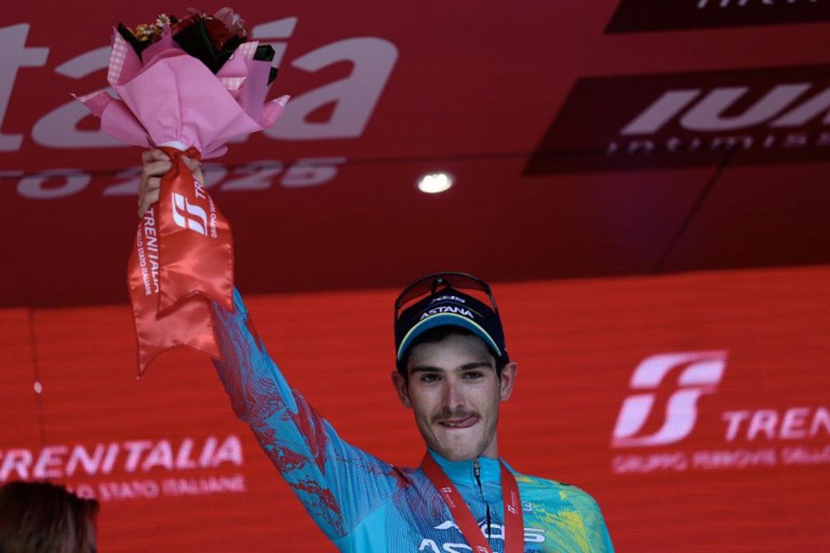 XDS Astana Team's Italian rider Christian Scaroni celebrates on the podium after victory in the 16th stage of the 108th Giro d'Italia cycling race of 203kms from Piazzola sul Brenta to San Valentino on May 27, 2025. Luca Bettini / AFP