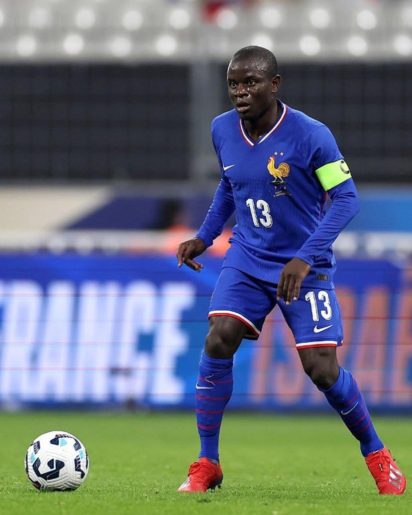 France's midfielder #13 N'Golo Kante runs with the ball during attends the UEFA Nations League, League A Group A2 football match between France and Israel at the Stade de France stadium in Saint-Denis, in the northern outskirts of Paris, on November 14, 2024. FRANCK FIFE / AFP