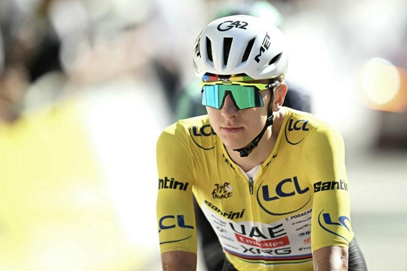 UAE Team Emirates - XRG's Slovenian rider Tadej Pogacar wearing the overall leader's yellow jersey cycles with the pack of riders (peloton) past the finish line of the 18th stage of the 113th edition of the Tour de France cycling race, 185,2 km between Voiron and Orcières-Merlette in the French Alps, on July 23, 2026. Loic VENANCE / AFP