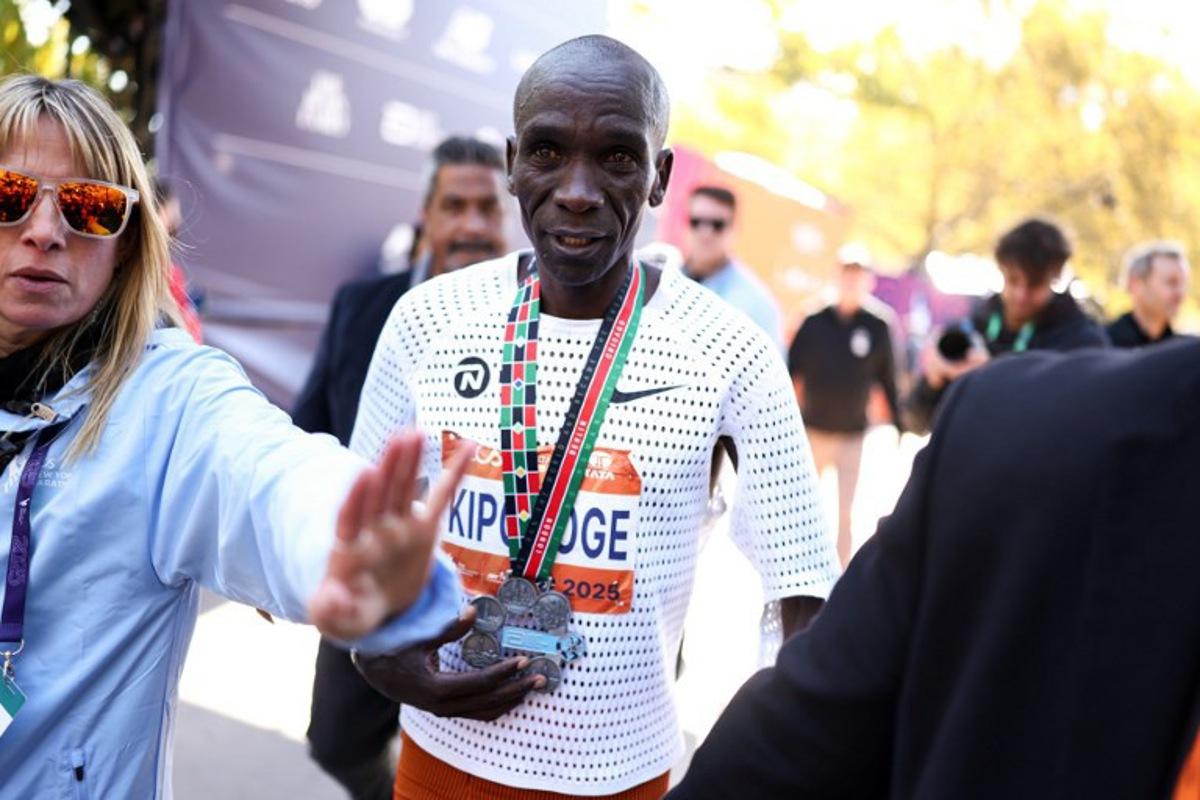 Eliud Kipchoge of Kenya walks away after competing in the New York marathon in New York on November 2, 2025. CHARLY TRIBALLEAU / AFP