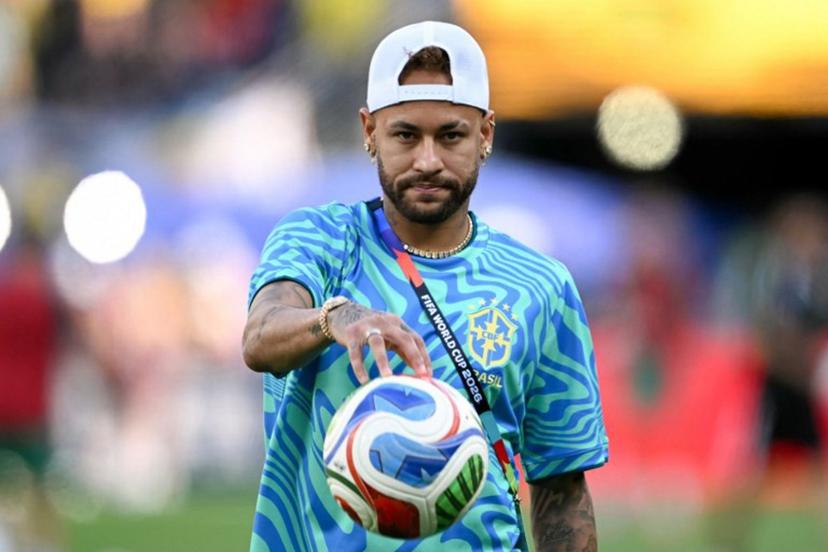Brazil's forward #10 Neymar gestures during a warm up ahead of the 2026 World Cup Group C football match between Brazil and Morocco at the New York/New Jersey Stadium in East Rutherford on June 13, 2026. Mauro PIMENTEL / AFP