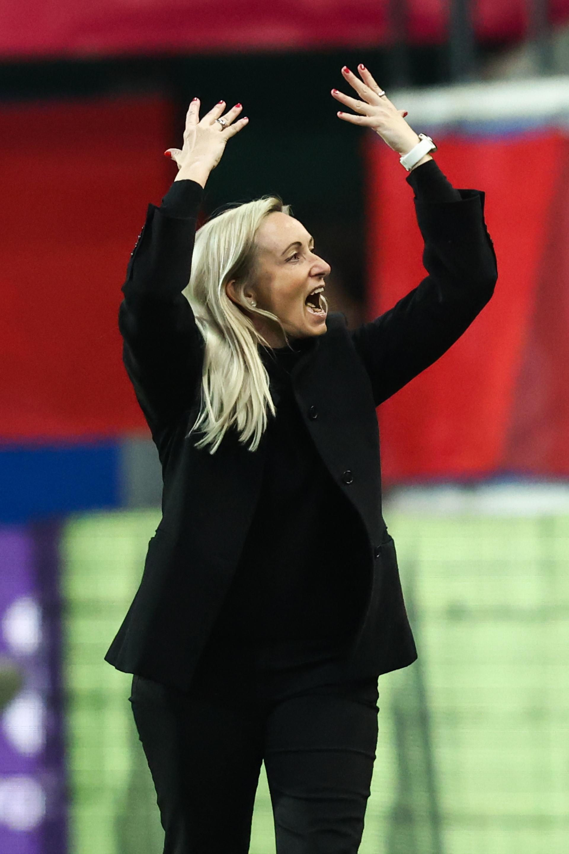 Belgium's head coach Elisabet Gunnarsdottir celebrates during a soccer game between the national teams of Belgium (Red Flames) and England, on the fourth matchday in group A3 of the 2024-25 Women's Nations League competition, on Tuesday 08 April 2025 in Heverlee, Leuven. BELGA PHOTO BRUNO FAHY