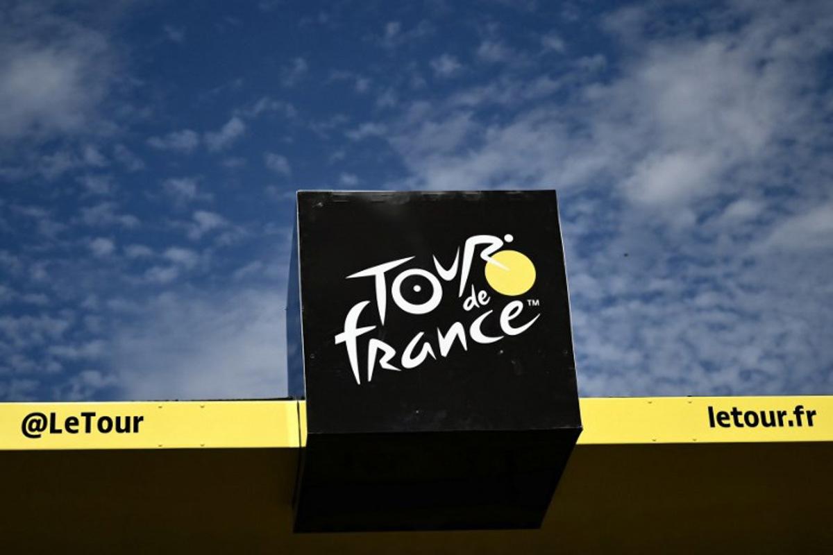 The Tour de France logo adorns the podium at the finish line of the 12th stage of the 111th edition of the Tour de France cycling race, 203,6 km between Aurillac and Villeneuve-sur-Lot, southwestern France, on July 11, 2024. Marco BERTORELLO / AFP