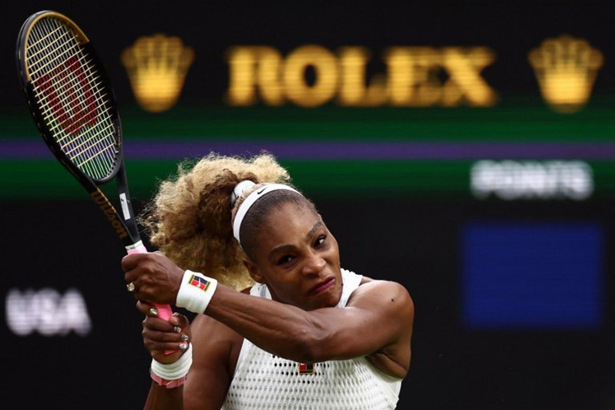 US player Serena Williams returns the ball to Australia's Maya Joint during their women's singles first round tennis match on the second day of the 2026 Wimbledon Championships at The All England Lawn Tennis and Croquet Club in Wimbledon, southwest London, on June 30, 2026. HENRY NICHOLLS / AFP