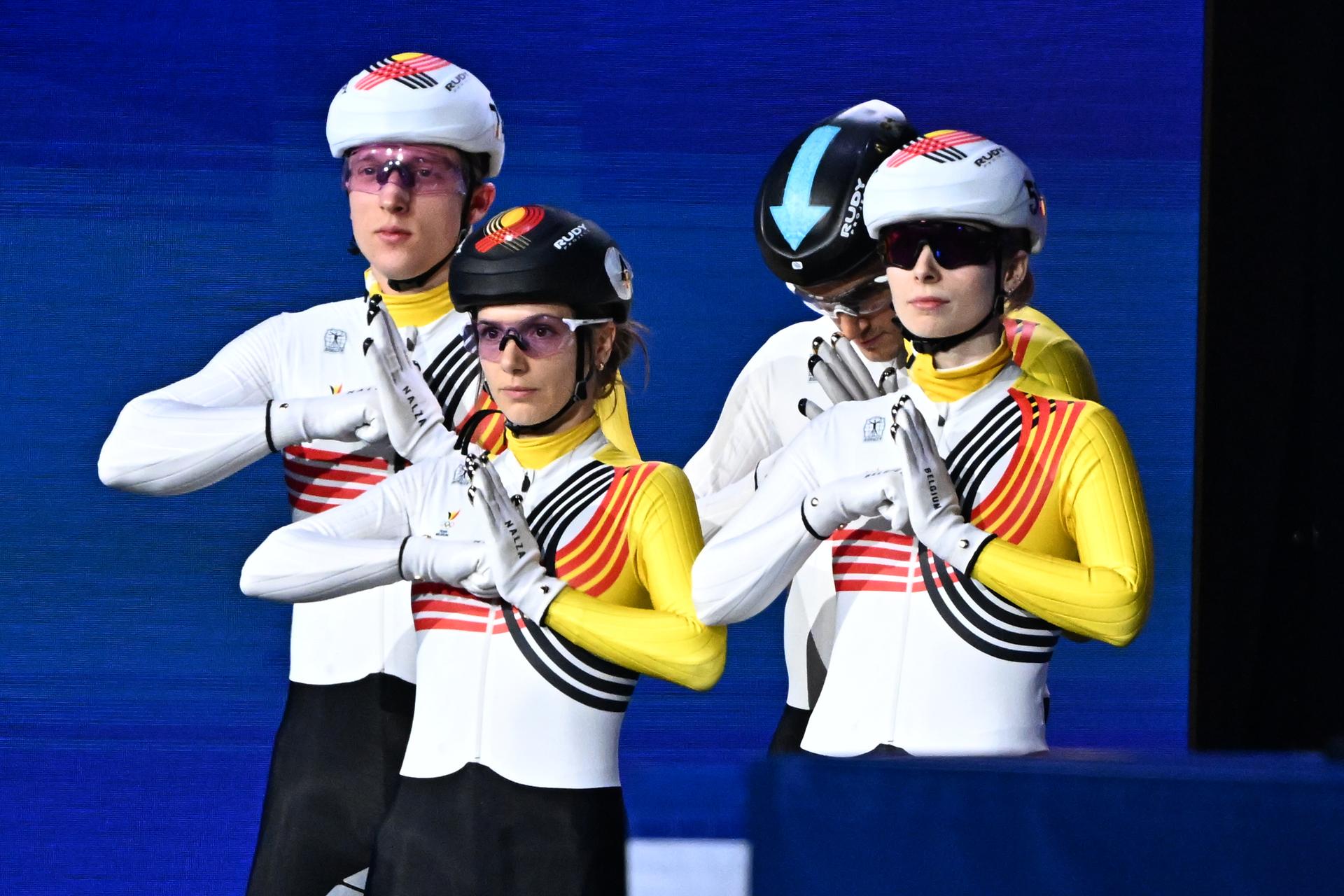 Belgian shorttrack skater Ward Petre, Belgian shorttrack skater Hanne Desmet, Belgian shorttrack skater Stijn Desmet and Belgian shorttrack skater Tineke den Dulk pictured ahead of the Final of the Mixed Team Relay of the Short Track Speed Skating competition at the Milano Cortina 2026 Olympic Winter Games, on Tuesday 10 February 2026 in Milan, Italy. The XXV Winter Olympics take place from 6 to 22 February 2026 in Italy. BELGA PHOTO JASPER JACOBS