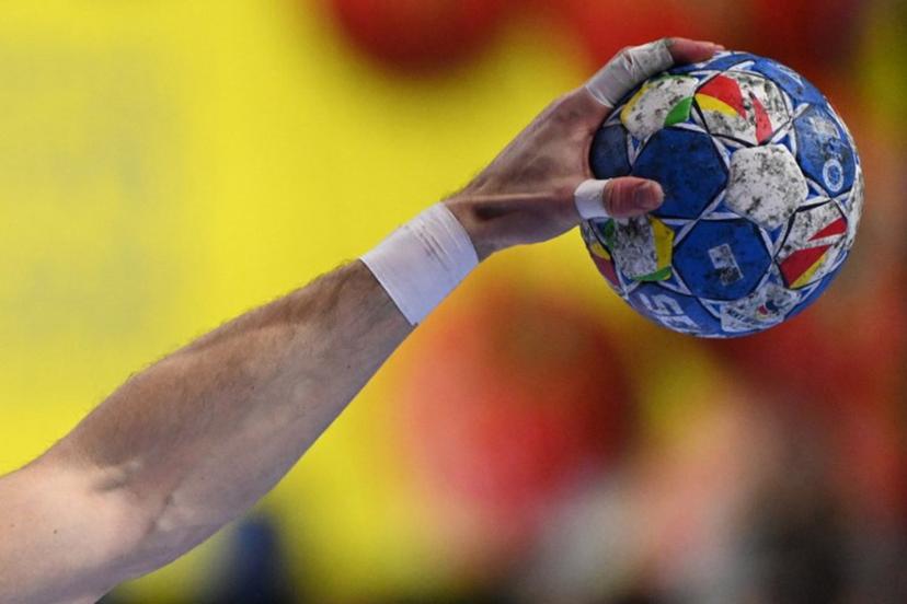 Germany's right back #25 Kai Haefner plays the ball during the Men's EURO 2024 EHF Handball European Championship match for third place between Sweden and Germany in Cologne, western Germany on January 28, 2024. Kirill KUDRYAVTSEV / AFP