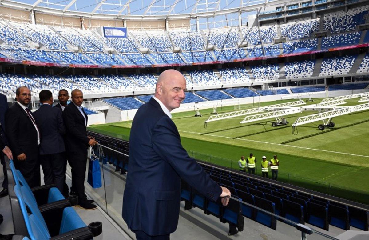This handout picture released by the Federation Royale Marocaine De Football (FRMF) on September 20, 2025, shows FIFA President Gianni Infantino looking at the stadium during a tour of the Grand stade of Tangier. Federation Royale Marocaine De Football / AFP