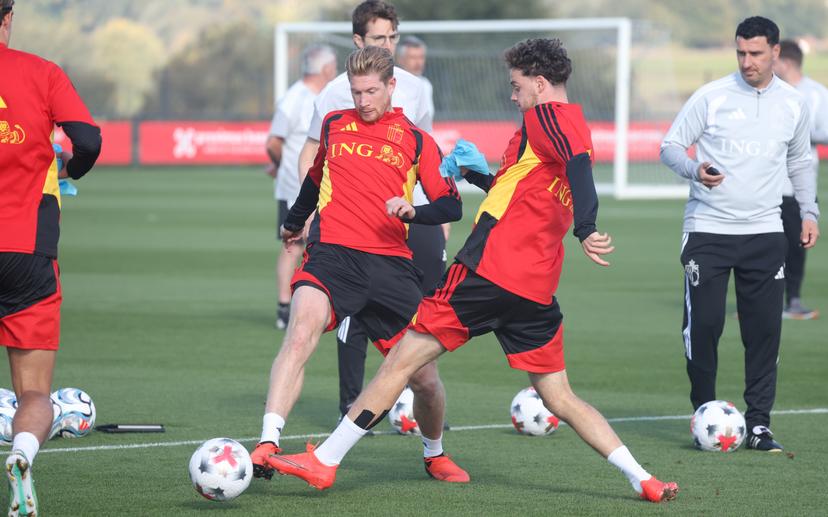 Belgium's Kevin De Bruyne and Belgium's Maxim De Cuyper fight for the ball during a training session of the Red Devils, the Belgian national soccer team, at the national training center in Tubize, Sunday 4 October 2026. The team is preparing for their game against France on Monday, their fourth game in the UEFA Nations League competition. BELGA PHOTO VIRGINIE LEFOUR