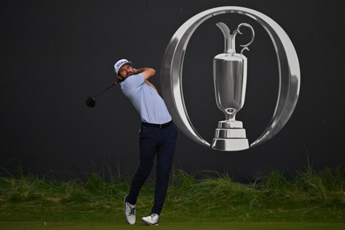 US golfer Cameron Young watches his drive from the 1st tee during practice ahead of the 153rd Open Championship at Royal Portrush golf club in Northern Ireland on July 16, 2025. Glyn KIRK / AFP