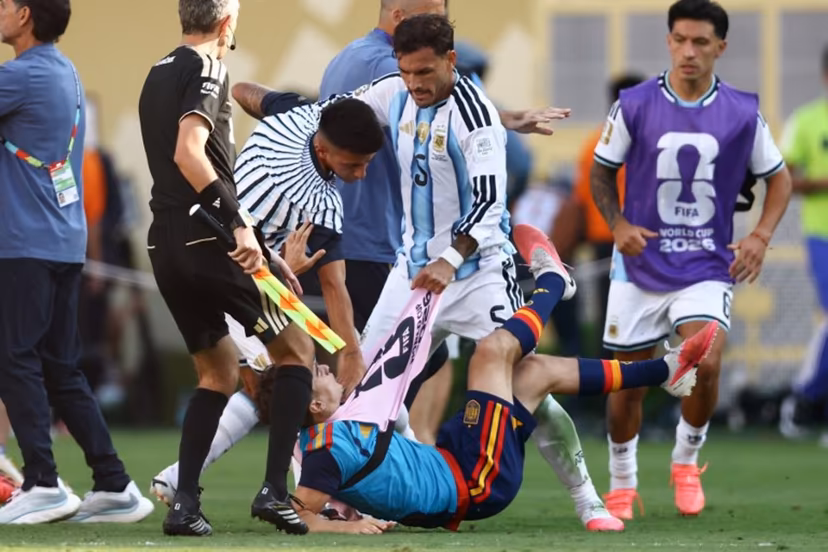Argentina's midfielder #05 Leandro Paredes (top) clashes with Spain's midfielder #09 Gavi during the 2026 World Cup football tournament final match between Spain and Argentina at the New York/New Jersey Stadium in East Rutherford on July 19, 2026. CHARLY TRIBALLEAU / AFP