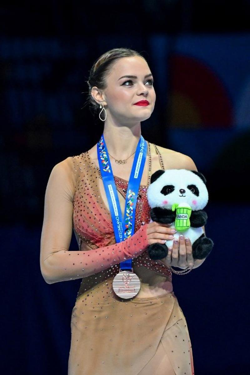 Bronze medallist Belgium's Loena Hendrickx attends an awards ceremony for women's free skating during the ISU Skate to Milano Figure Skating Qualifier 2025 in Beijing on September 20, 2025. ADEK BERRY / AFP