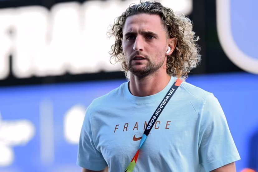France's midfielder #14 Adrien Rabiot steps out of the team's bus ahead of its arrival for the 2026 World Cup round of 16 football match between Paraguay and France at the Philadelphia Stadium in Philadelphia on July 4, 2026. MAURO PIMENTEL / AFP