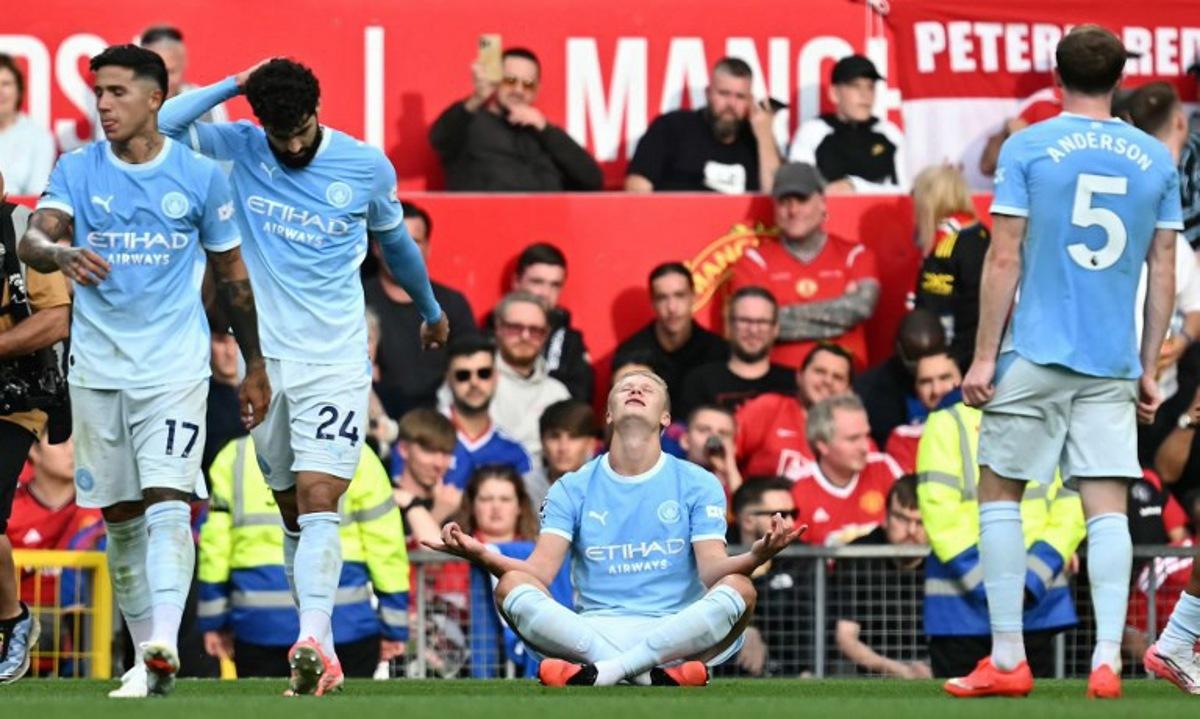 Manchester City's Norwegian striker #09 Erling Haaland celebrates scoring the team's first goal during the English Premier League football match between Manchester United and Manchester City at Old Trafford in Manchester, north west England, on September 13, 2026. Paul ELLIS / AFP