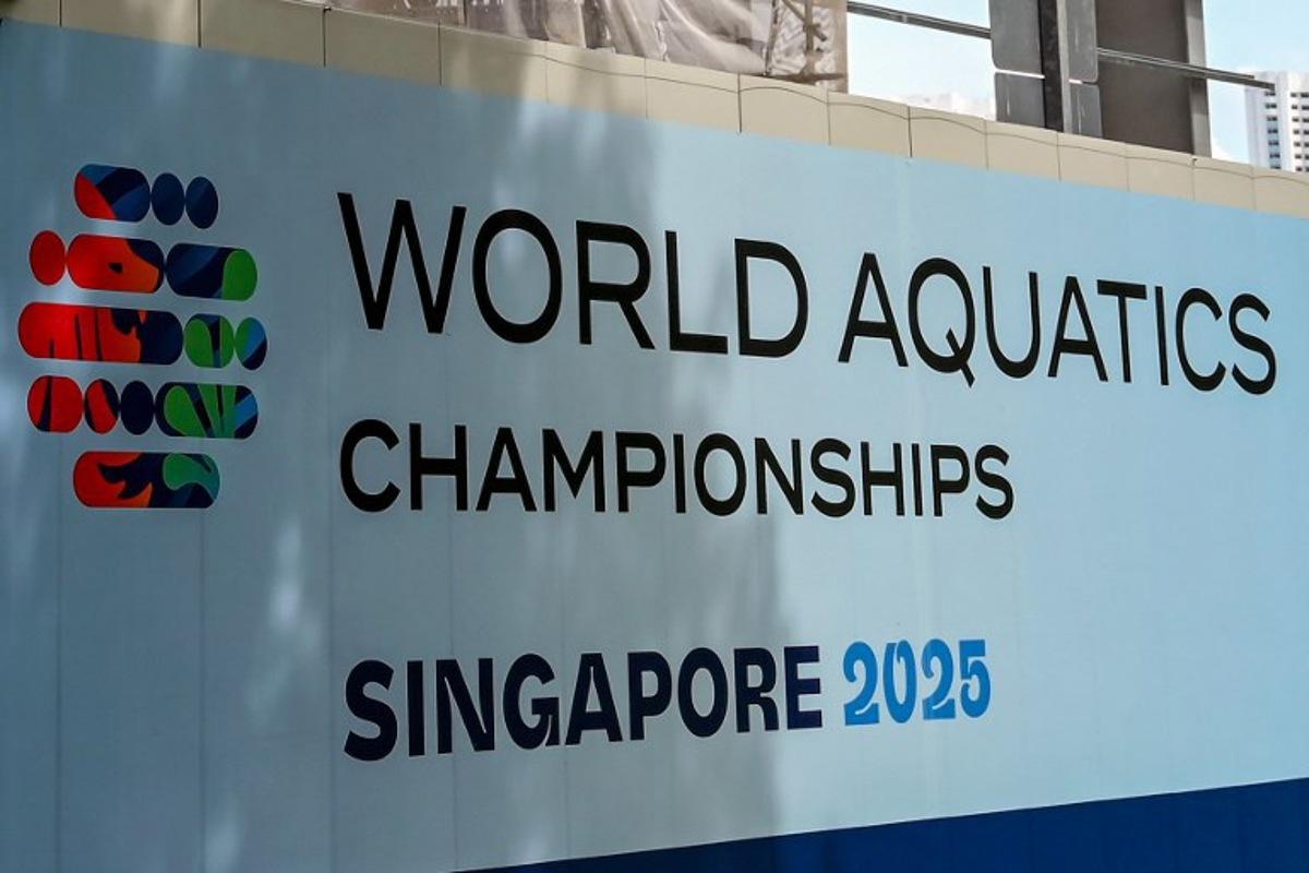 The logo for the upcoming World Aquatics Championships 2025 is pictured outside the construction site for the aquatics arena being built in Singapore on February 4, 2025. Roslan RAHMAN / AFP