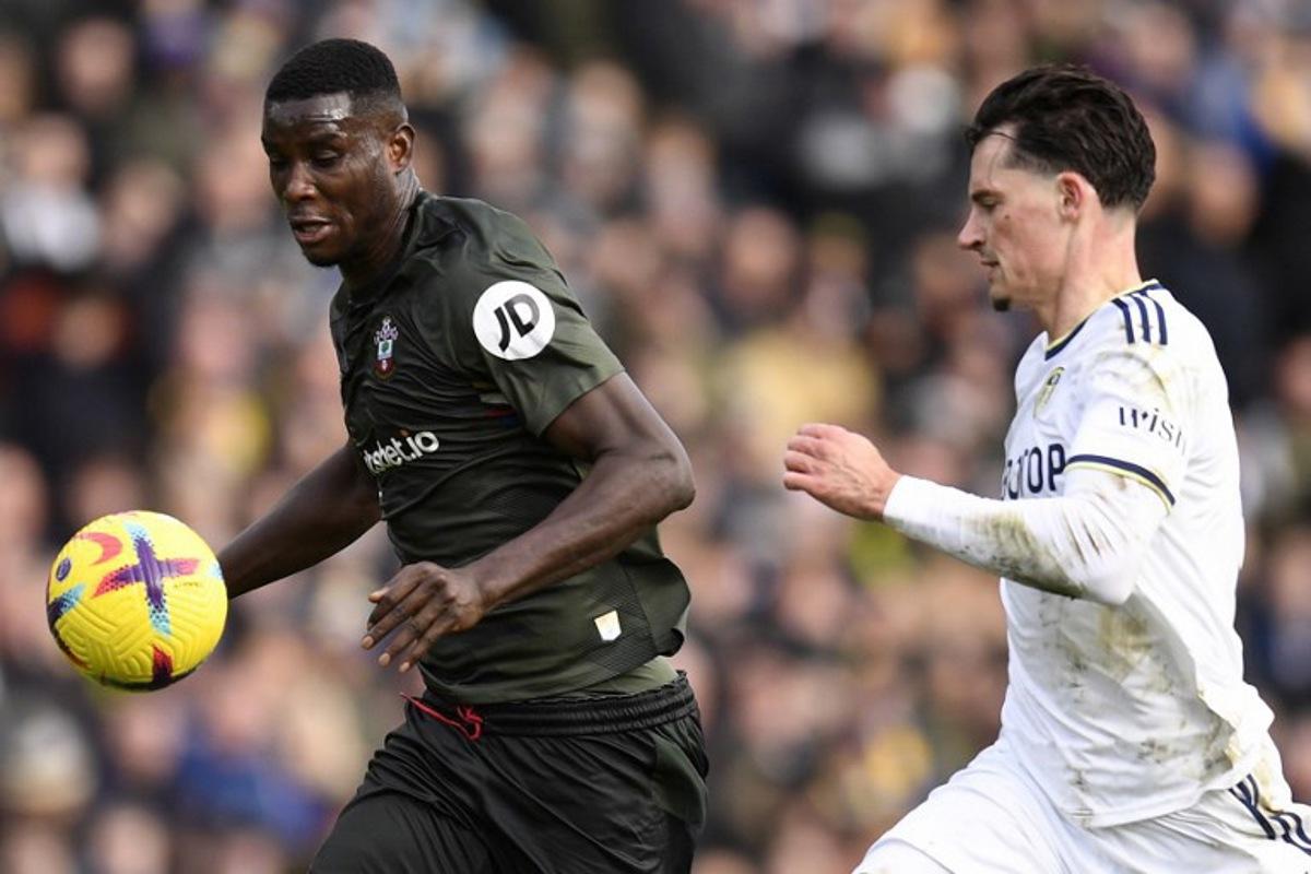 Leeds United's German defender Robin Koch (R) vies with Southampton's Nigerian striker Paul Onuachu during the English Premier League football match between Leeds United and Southampton at Elland Road in Leeds, northern England on February 25, 2023. Oli SCARFF / AFP