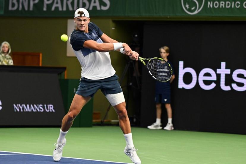 Denmark's Holger Rune returns the ball to France's Ugo Humbert (not in Picture) during the semi-final of the BNP Paribas Nordic Open tennis tournament at the Royal Swedish Tennis Hall in Stockholm, Sweden, on October 18, 2025. Anders WIKLUND / TT NEWS AGENCY / AFP