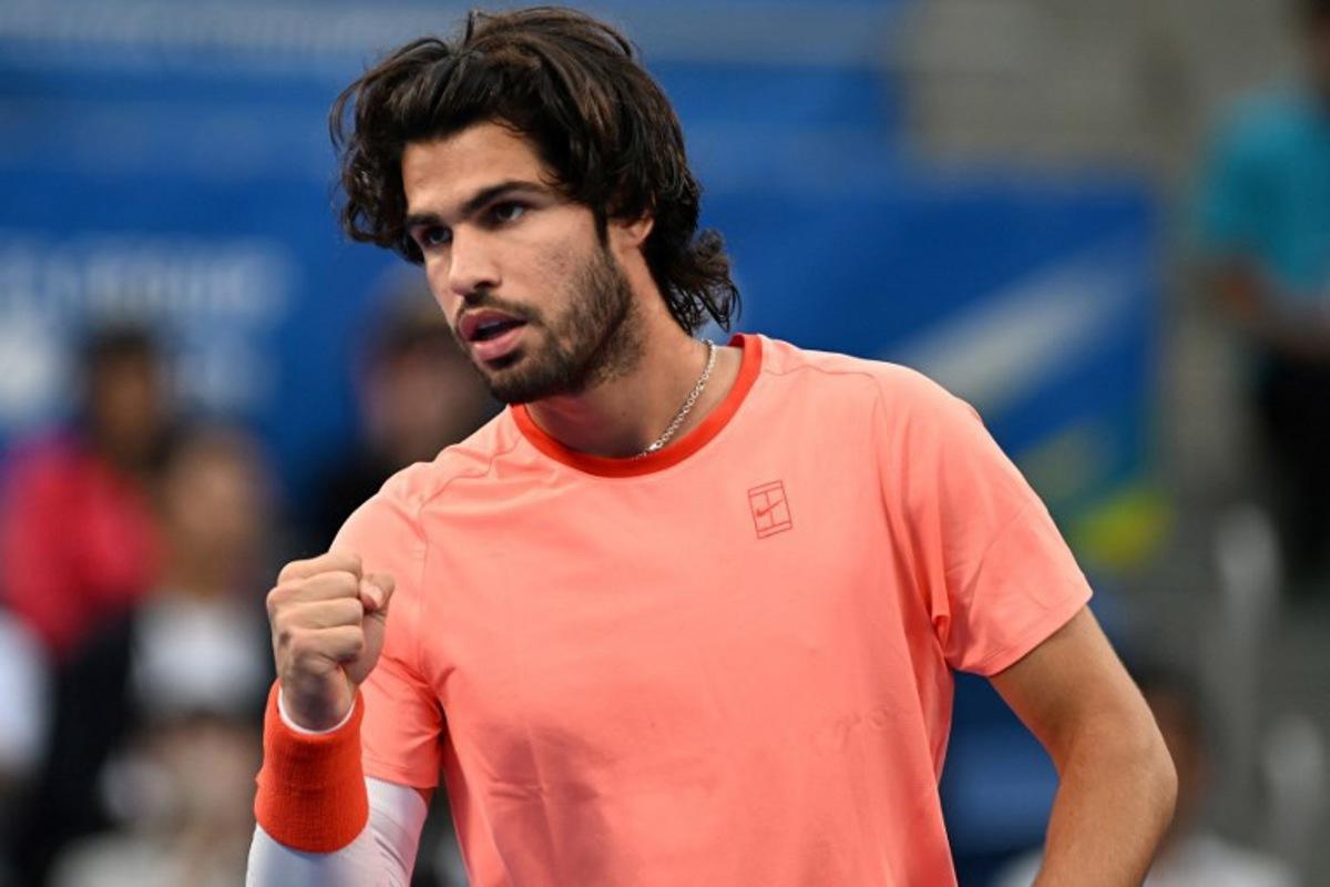 Spain's Carlos Alcaraz reacts as he plays against compatriot Jaume Munar during their men's singles semi-final tennis match at the ATP Tour Japan Open Tennis Championships at the Ariake Tennis Forest Park in Tokyo on October 5, 2026. Rie KIKUCHI / AFP