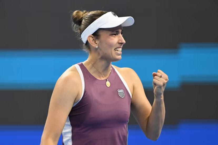 Belgium's Elise Mertens reacts after beating Poland's Iga Swiatek in their women's singles quarter-final at the China Open tennis tournament in Beijing on October 9, 2026. GREG BAKER / AFP