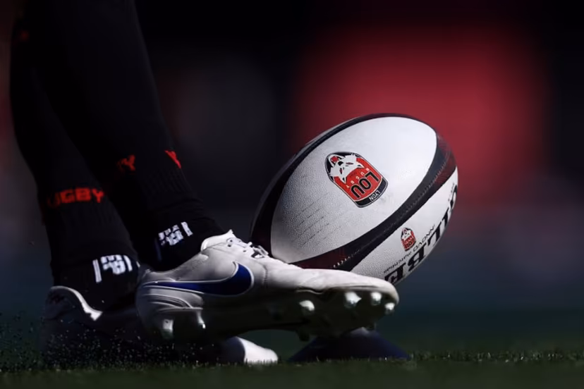 Lyon's French fly-half Leo Berdeu kicks the ball during the warm-up ahead of the French Top 14 rugby union match between Lyon Olympique Universitaire (LOU) and Section Paloise (Pau) at the Gerland Stadium in Lyon, central-eastern France, on September 19, 2026. Alex MARTIN / AFP