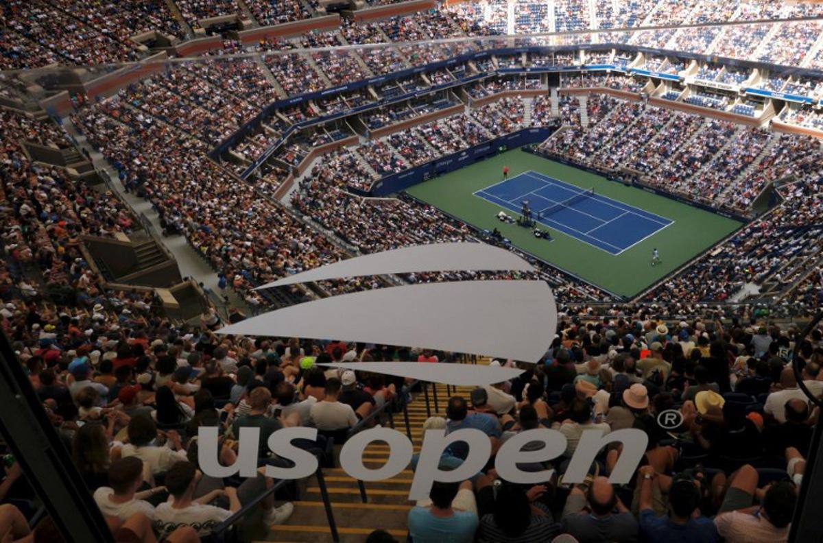 Attendees watch as USA's Taylor Fritz faces Serbia's Novak Djokovic during the US Open tennis tournament men's singles quarter-finals match at the USTA Billie Jean King National Tennis Center in New York City, on September 5, 2023. Kena BETANCUR / AFP