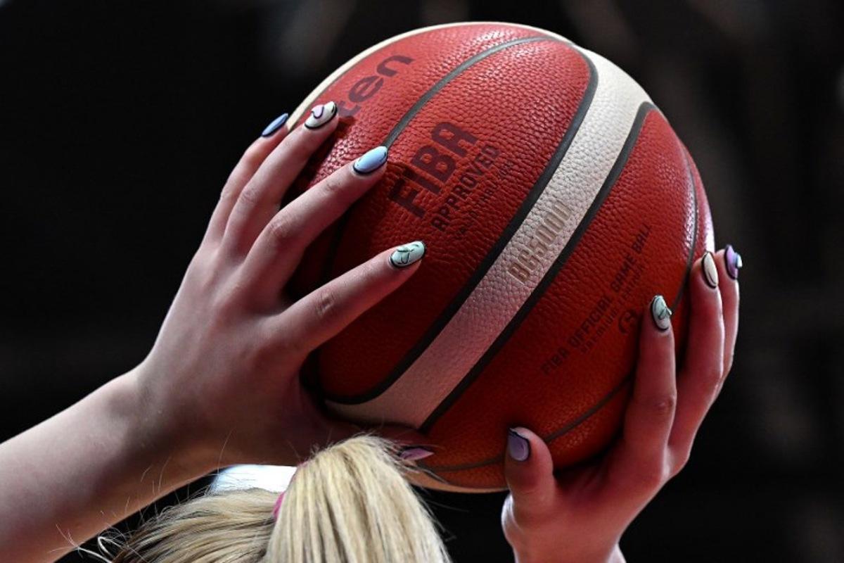 China's Li Meng takes a free throw during the women's Asia Cup 2023 basketball game against New Zealand in Sydney on June 27, 2023. Saeed KHAN / AFP