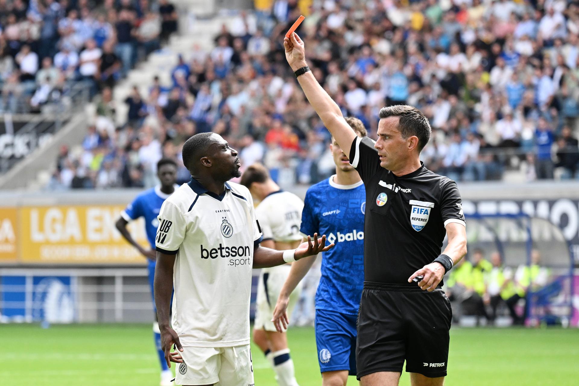 Club's Carlos Forbs receives a red card from referee Erik Lambrechts a soccer match between KAA Gent and Club Brugge, Sunday 30 August 2026 in Gent, on day 4 of the 2026-2027 'Jupiler Pro League' first division of the Belgian championship. BELGA PHOTO KURT DESPLENTER