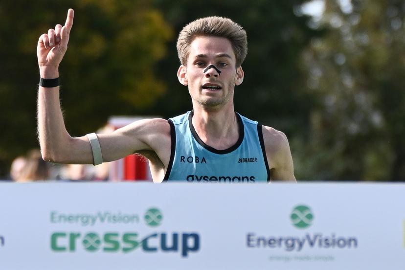 Belgian Yorick Van De Kerkhove celebrates as he crosses the finish line to win the men's race at the CrossCup cross country running athletics event in Roeselare on Sunday 25 October 2026. BELGA PHOTO ELIAS ROM