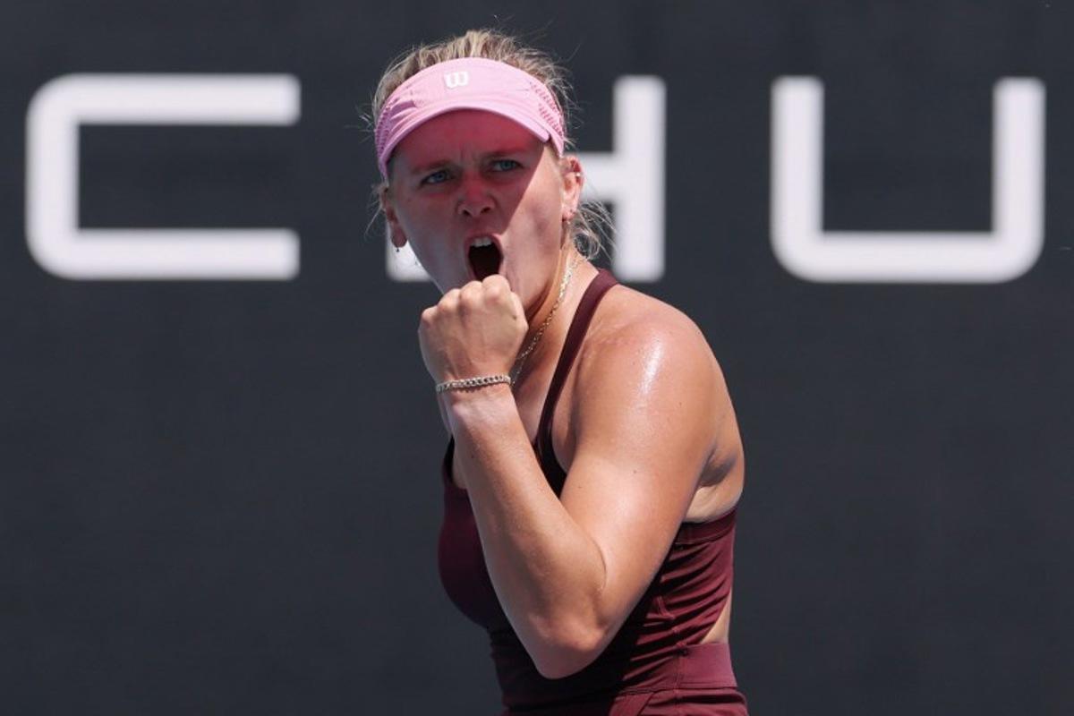 USA's Peyton Stearns reacts after winning the first set against compatriot Sofia Kenin during their women's singles match on day two of the Australian Open tennis tournament in Melbourne on January 19, 2026. IZHAR KHAN / AFP