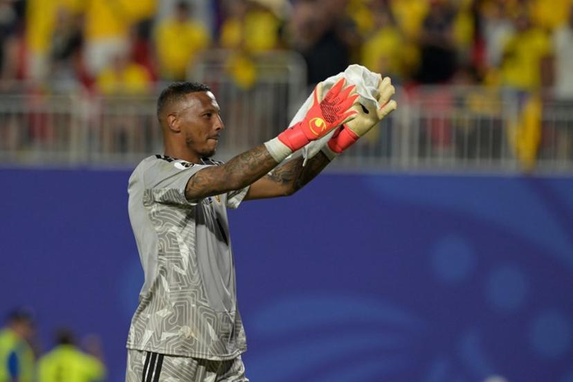 Curacao's goalkeeper #01 Eloy Room celebrates at the end of the 2026 World Cup Group E football match between Ecuador and Curacao at the Kansas City Stadium in Kansas City on June 20, 2026. JUAN MABROMATA / AFP