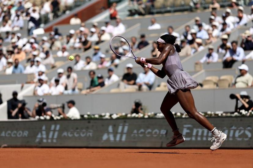 US Coco Gauff plays a backhand return to US Taylor Townsend during their women's singles match on day 3 of the French Open tennis tournament on Court Philippe-Chatrier at the Roland-Garros Complex in Paris on May 26, 2026. Anne-Christine POUJOULAT / AFP