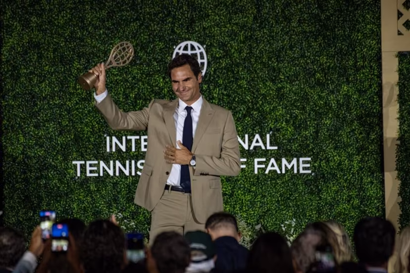 Swiss former tennis player Roger Federer accepts his induction into the International Tennis Hall of Fame during a ceremony in Newport, Rhode Island, on August 29, 2026. Joseph Prezioso / AFP