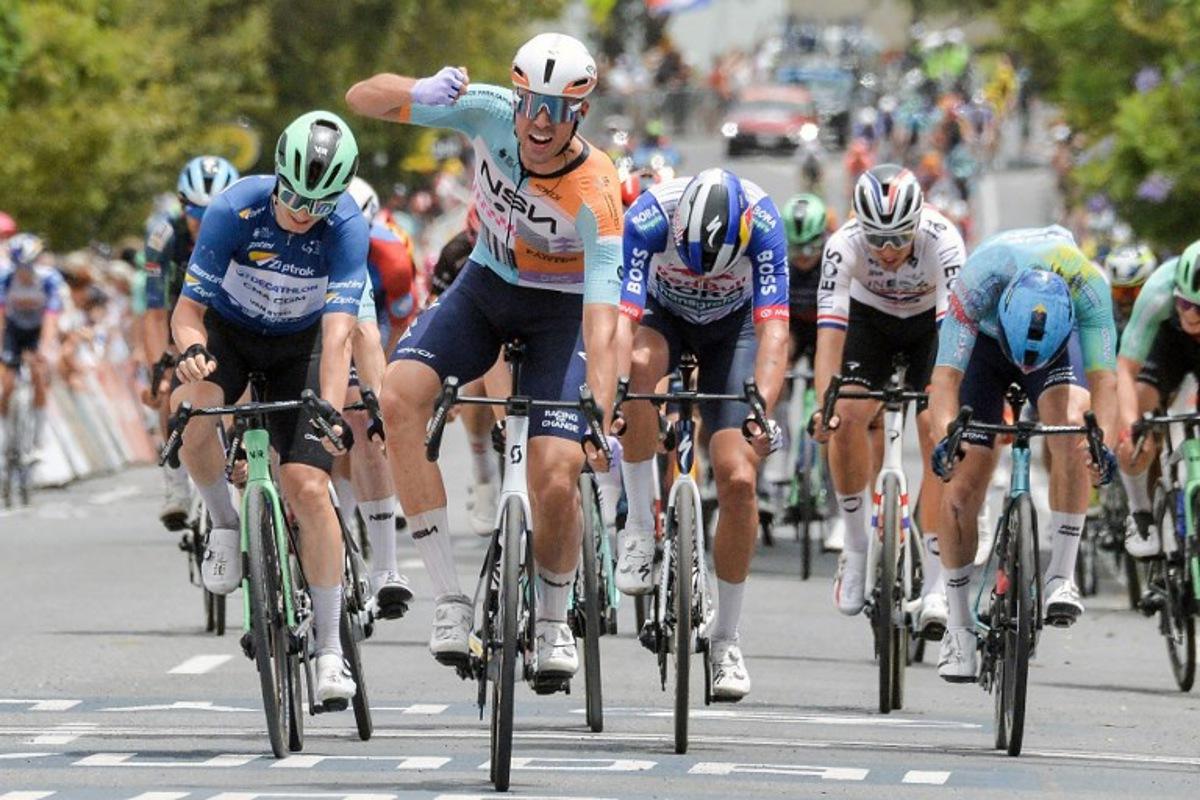 NSN Cycling Team's British rider Ethan Vernon (2nd L) crosses the finish line to win stage four of the Tour Down Under UCI men's cycling race in Adelaide on January 24, 2026. Brenton Edwards / AFP