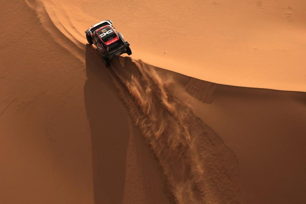 Qatari driver Nasser Al Attiyah and French co-driver Edouard Boulanger compete during Stage 7 of the Dakar Rally 2025, between Al Duwadimi and Al Duwadimi, Saudi Arabia, on January 11, 2025. Valery HACHE / AFP