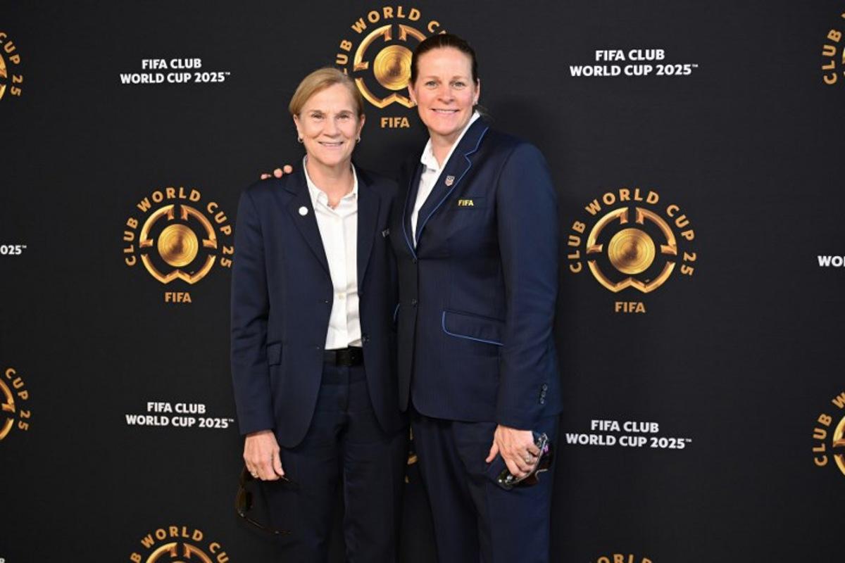 FIFA Chief Football Officer Jill Ellis (L) and President of the United States Soccer Federation Cindy Parlow Cone pose on the Golden Carpet upon arrival for the FIFA Club World Cup 2025 final football match between England's Chelsea and France's Paris Saint-Germain at the MetLife Stadium in East Rutherford, New Jersey on July 13, 2025. ANGELA WEISS / AFP