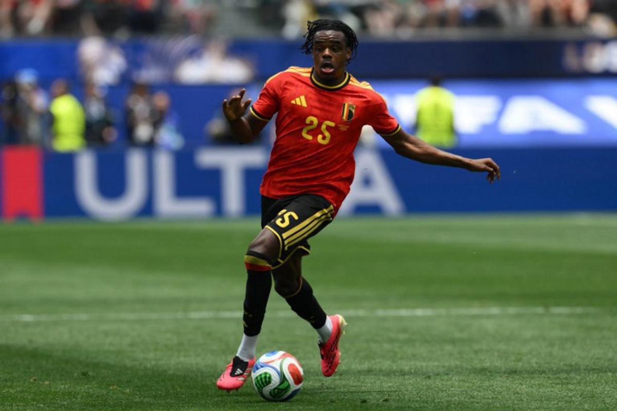 Belgium's defender #25 Nathan Ngoy controls the ball during the 2026 World Cup Group G football match between Belgium and Iran at the Los Angeles Stadium in Inglewood on June 21, 2026. Patrick T. Fallon / AFP